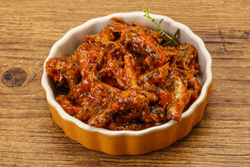 Canned anchovy in tomato sauce