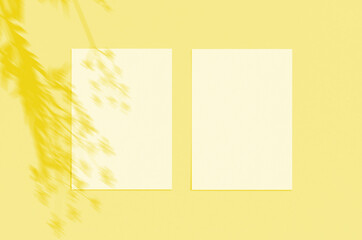 Blank white vertical paper sheet 5x7 inches with shadow overlay. Illuminating Pantone Color Of The Year 2021. Modern and stylish greeting card or wedding invitation mock up.