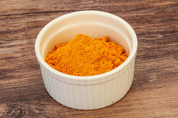 Tumeric powder in the bowl