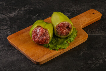 Raw stuffed bell pepper with meat