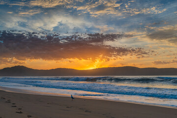 Obraz premium Sunrise seascape at the beach with haze and cloud
