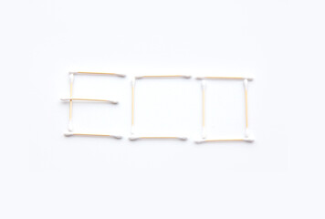 Word Eco made of wooden cotton swabs on white background. Sustainability and eco living concept