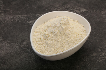 Wheat flour heap in the bowl