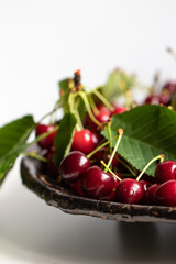 Sweet Ripe Cherries in the Bowl. Prunus avium. Treat of the Nature
