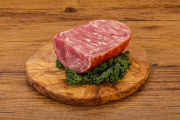 Beef ham piece over board