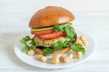 Hummus Chickpea Burger on white background.