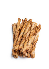 Spicy puff pastry twists isolated on white