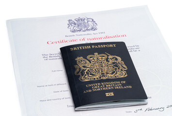 First Iconic blue post brexit 2021 style British passport with naturalization certificate