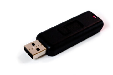 A pink USB flash drive with a plastic case, shot against a white background.