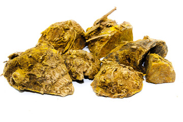 dried turmeric isolated on the white background