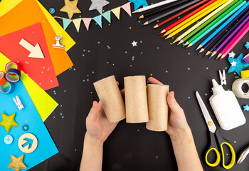 Step-by-step instruction crafts with children from rolls of toilet paper on the theme of space and rocket. Step 1.