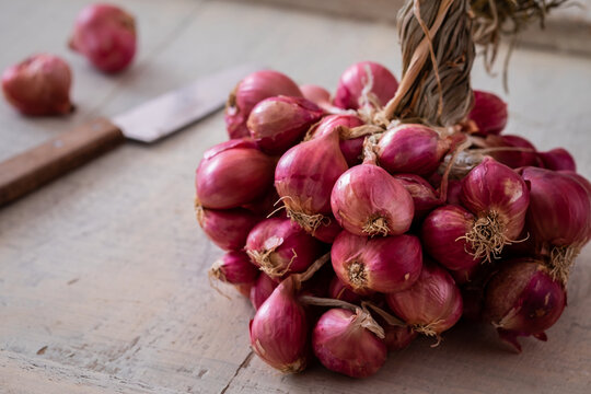 Bunch of shallot on wooden table