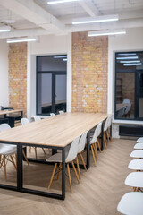 Room in the office with a big table for negotiations