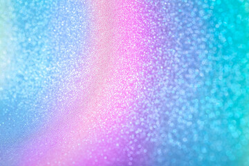 Sparkling glitter background with blur. Macro photo of shiny grainy paper with gradient blue and magenta coating - 419810780