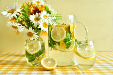 bouquet of wild flowers and fresh lemonade, sassy water. Vitamins concept. Strengthening immunity concept. Summer mood
