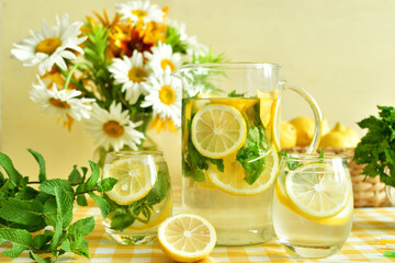 bouquet of wild flowers and fresh lemonade, sassy water. Vitamins concept. Strengthening immunity concept. Summer mood
