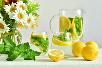 bouquet of wild flowers and fresh lemonade, sassy water. Vitamins concept. Strengthening immunity concept. Summer mood