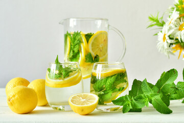 bouquet of wild flowers and fresh lemonade, sassy water. Vitamins concept. Strengthening immunity concept. Summer mood