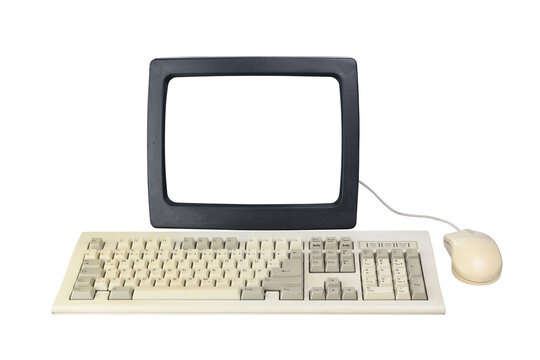 Old computer from the 1990s with a white screen for adding videos and images, retro keyboard and mouse isolated on a white background.