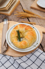 Close-up of Tasty croissants on wooden background