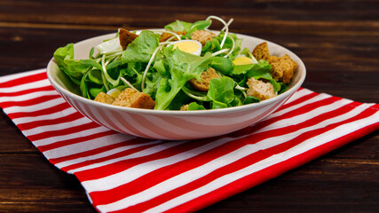 Sunflower sprout salad with a variety of kinds of natural vegetables and crunchy bread. Healthy and diet menu idea