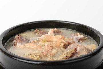 Pork intestines soup on white background
