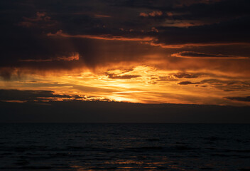 Sunset views in Latvia. Calm and beautiful Baltic sea at sunset