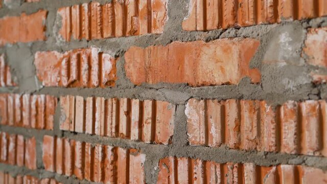 Brick wall of an apartment building under construction. Brick wall in the apartment.
