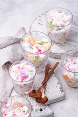 Multicolored dessert with fruit jelly