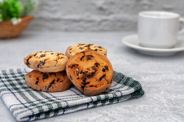 Fresh homemade cookies on a napkin on a light background