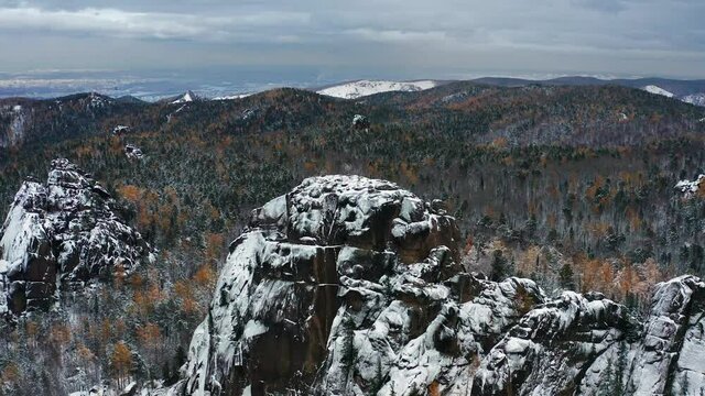 Eastern Sayans. Krasnoyarsk Pillars National Park. Siberian taiga in winter. Aerial view.