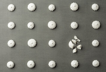 Fototapeta na wymiar Small white meringues on the table.