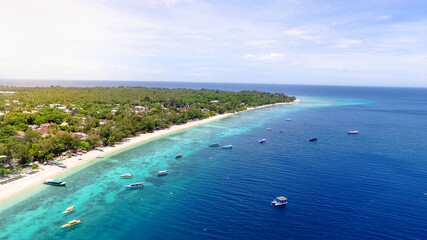 Fototapeta na wymiar Aerial Gili Trawangan with turquoise water, Tropical island with white sandy beach and blue transparent water