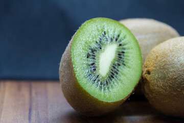 sliced kiwi close-up on wooden table