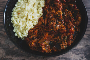 vegan aubergine spinach curry with rice, healthy plant-based food