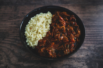 vegan aubergine spinach curry with rice, healthy plant-based food