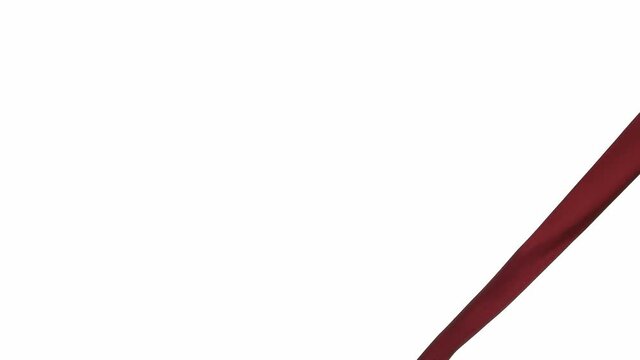 Red fluttering ribbon on white background
