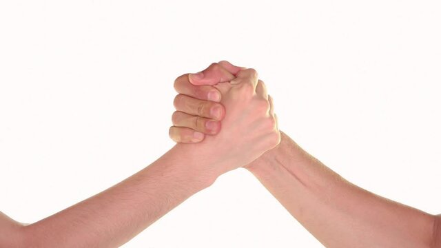 Arm wrestle and handshake over white background