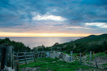 Dramatic sunset cloudy sky over Andalusian Atlantic coast of Tarifa in Punta Paloma