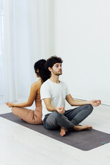 Fototapeta na wymiar Male and female doubles yoga asana gymnastics fitness
