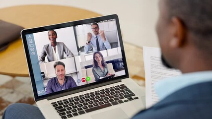 Black businessman working from home in video conference - Powered by Adobe