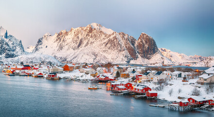 Dramatic evening cityscape of Reine town