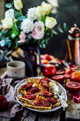 crepe suzette with bloody oranges .selective focus.