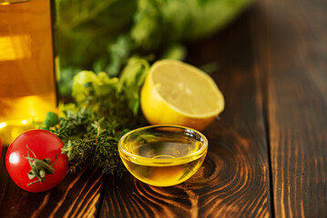 fresh herbs and vegetables on the wooden background