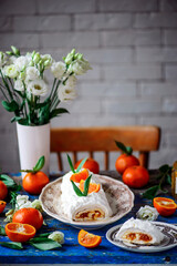 Meringue roll with tangerine jam.style vintage
