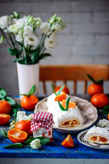 Meringue roll with tangerine jam.style vintage