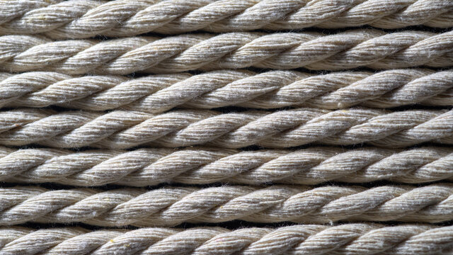 Close-up of horizontally coiled rope textured background
