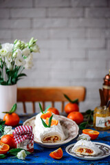 Meringue roll with tangerine jam.style vintage