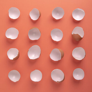 Peach background colour, pattern from egg shel. Easter minimal concept