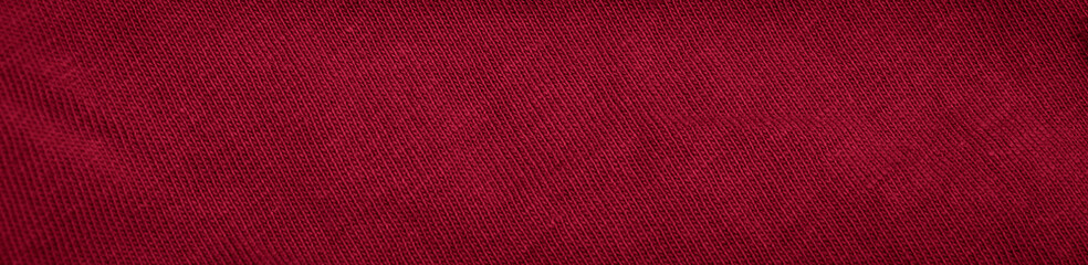 red cotton fabric with visible details. background or textura